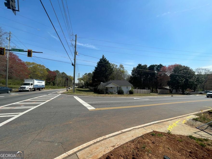 To be sold with 1510 Bells Ferry Rd (aka 15 Dickson Rd)  Approximately 1.54 Acres on the corner of Bells Ferry Rd. and Dickson Rd. Traffic signal at intersection with multiple points of egress. All utilities are currently available on property. Current zoning is R-20 with the potential for rezoning into a higher density or commercial/industrial based on future land use map. Can be sold with MlS: 7548878 for a much larger development. Combined Assemblage offers 18+ acres with substantial Road Frontage  1510 TaxID: 16087000020, 1520 TaxID: 16087000230
