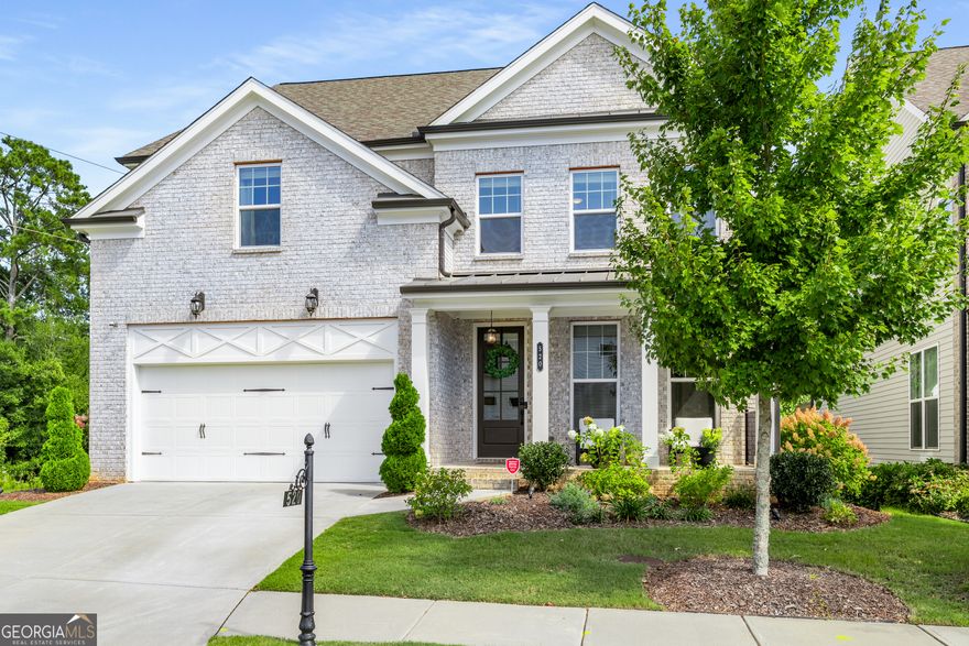 Welcome home to this stunning Craftsman-style residence with inviting front porch, blending timeless character with today's most sought-after features. Step inside to an open floor plan where a spacious dining room with custom shiplap walls sets the tone for stylish gatherings. The chef's kitchen impresses with quartz countertops, stainless steel appliances, farmhouse sink, gas cooktop, double ovens, and a breakfast bar. A sunny breakfast room opens seamlessly to a screened porch and deck - perfect for morning coffee or entertaining. The vaulted great room boasts exposed beams, a brick fireplace, and abundant natural light. On the main level, you'll also find a private bedroom or flex room with a designer full bath. Upstairs, the oversized primary suite features custom his-and-her walk-in closets and a spa-inspired bath with double vanities, soaking tub, and separate shower. Two additional bedrooms share a stylish bath with dual vanities.  The finished daylight terrace level expands the living space with a large recreation room, flex/bedroom with full bath, workout room, ample storage, and walkout patio. There is a whole house water purification system and Central Vacuum system. Enjoy resort-style living in this gated neighborhood, featuring a 13-acre park with walking trails, clubhouse, swim/tennis, playground, and HOA-maintained lawns for carefree living. Ideally located in Alpharetta with Forsyth County taxes, this home offers top-rated schools; Brandywine Elementary, DeSana Middle, and Denmark High.  Easy access to shopping, dining, and entertainment.