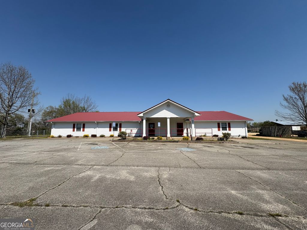 Photo of 513 Industrial Drive, Sandersville, GA 31082 (MLS # 10717442)