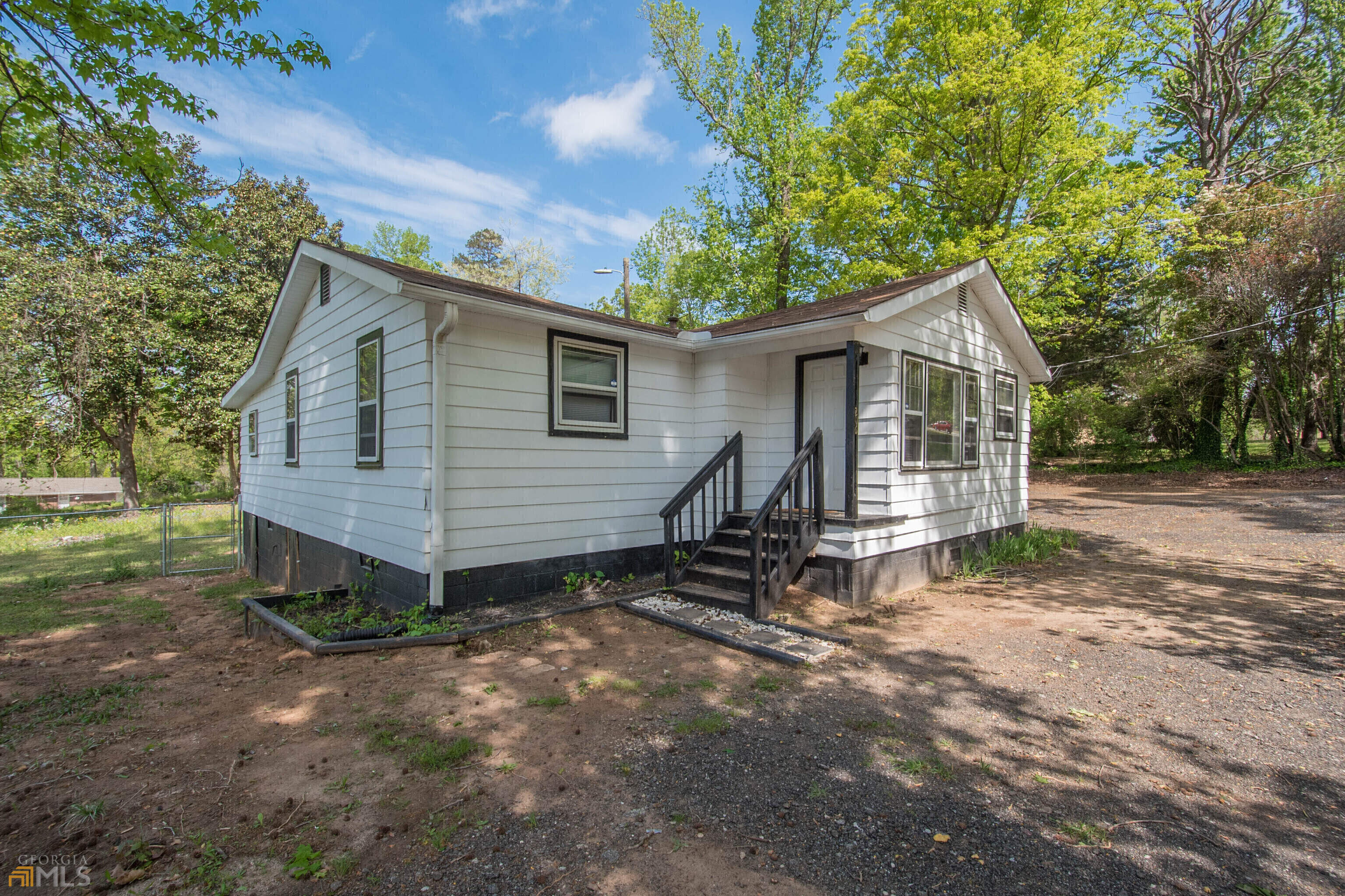 SUMMER IS HERE AND SO IS THE LAKE! ACCESS TO SWAN LAKE WITH THIS ONE! HERE YOU HAVE IT!! Home has been refurbished and converted to all electric! Affordable with plenty of potential. A renovation loan allows you to put your own twist on it. Fenced back yard with plenty of room for outside enjoyment, storage/work shed or whatever your needs are. LOOKING FOR A GREAT DEAL? LOOK NO FURTHER!