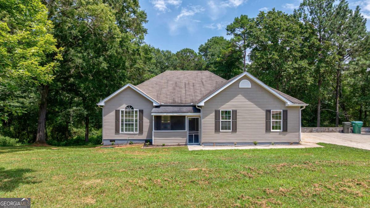 Welcome to 412 Ellerbe Drive, a beautifully updated 4-bedroom, 2-bath ranch nestled on a peaceful and private 1.26-acre lot in the heart of charming Statham, Georgia. This home offers the perfect blend of modern updates, functional space, and an unbeatable location all at an exceptional value. As you step inside, youll immediately notice the fresh, light-filled interior with LVP flooring that flows throughout the home, giving it a clean and contemporary feel. The living room features vaulted ceilings and a cozy fireplace, creating an open and inviting space for both relaxing and entertaining. Both bathrooms have been fully renovated with stylish, modern finishes, and the kitchen is a standout with granite countertops, stainless steel appliances, and a stunning herringbone tile backsplash making meal prep both functional and inspiring. French doors lead you to a freshly renovated back deck that overlooks your wooded backyard oasis, perfect for grilling, entertaining, or simply enjoying the peaceful sounds of nature. A brand-new HVAC system is currently being installed, providing energy-efficient comfort and peace of mind for years to come. Location-wise, you truly get the best of all worlds: just minutes away, downtown Statham offers small-town charm with local coffee shops, boutiques, and community events; a short drive takes you to Winder for larger shopping centers, dining options, and medical facilities; and for those craving the energy and entertainment of city life, Athens, Georgia home to the University of Georgia and a nationally recognized music, arts, and dining scene is less than 20 minutes away, offering everything from Bulldogs football games to live music, eclectic restaurants, and historic downtown charm. 412 Ellerbe Drive is coming soon and offers the space, updates, and lifestyle youve been waiting for stay tuned, this is one youll want to see in person!