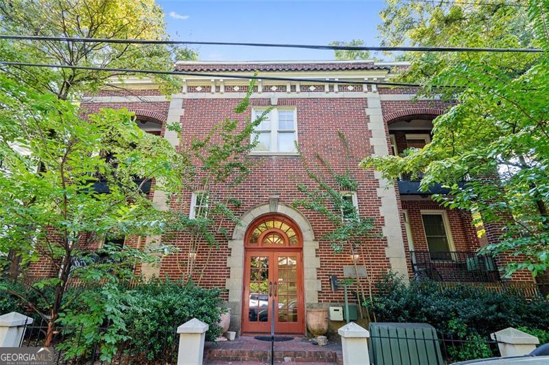 Discover this charming unit at The Frederica, a welcoming retreat in the heart of Virginia Highland. With freshly painted interiors, gleaming hardwood floors, and an open layout, this thoughtfully designed space makes city living both comfortable and convenient. A bright wall of windows fills the home with natural light. Space off the kitchen allows you to customize the space as a dining area or an office adding to the versatility. A full-size washer and dryer, located in a large walk-in closet, provides storage within the unit. The dedicated parking space ensures stress-free access, and the updated bathroom adds a touch of classic charm. Just steps from parks, shops, and dining, this location offers an unbeatable intown lifestyle. Seller will pay 1 year of HOA with an acceptable offer.