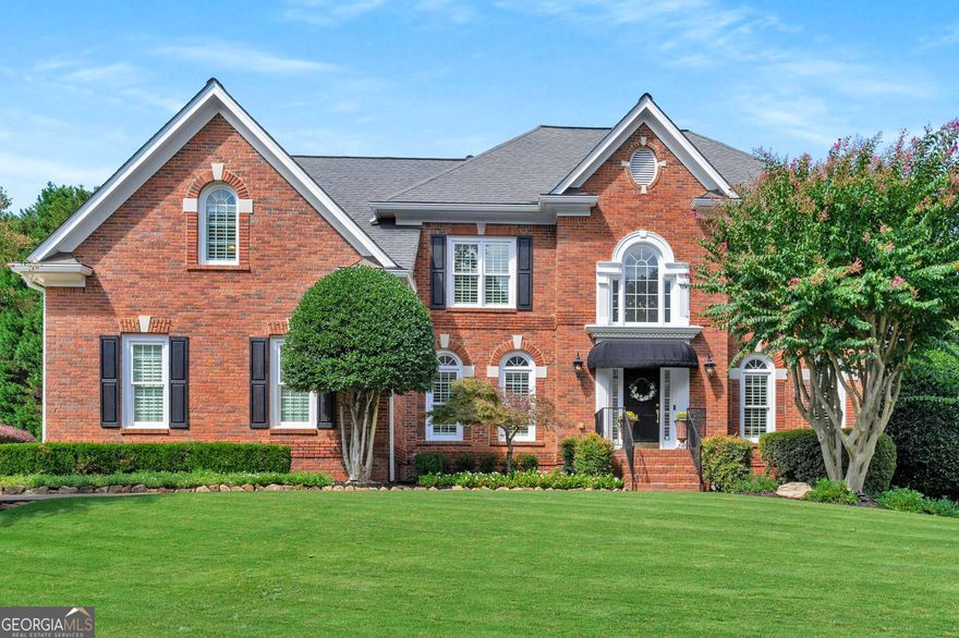 Welcome Home to this tastefully renovated 5 bed, 5 bath, 3-car garage home in the highly sought-after swim/tennis community of Chartwell! Newer HVAC and Newer Windows! This 4-sided brick beauty has a spacious main living level perfect for entertaining! A showcase eat-in kitchen complete with top-of-the line appliances (Wolf, Subzero, Bosch, Sharp), pot-filler, island, breakfast bar with beverage cooler, wall of windows, custom cabinets and adjacent sun-filled breakfast area. Walk out from the breakfast nook to find a fabulous vaulted covered deck with beautiful stone and brick wood-burning fireplace! Upstairs, you'll find a beautiful primary bedroom with luxurious tray ceiling detail, newly renovated primary bath with dual vanities, enormous walk-in shower, and large custom walk-in closet! The full, finished walk-out daylight terrace level includes a large multi-purpose space, additional family room, media room, kitchenette with full refrigerator, microwave, sink and beverage cooler, and a full guest bathroom. Outside on the terrace level offers a large patio with both covered and uncovered areas, with upgraded convenient, low-maintenance epoxy coating. A fence enclosure makes this patio area private and pet-friendly! In addition this large lot sits in a quiet location between two cul-de-sacs and has plenty of useable yard space for fun and games! Chartwell community includes pool, tennis courts, clubhouse, playground, and a community lake, and is located just steps to Newtown Park, shopping, restaurants, and more! Easy access to GA 400! DON'T WAIT, be sure to schedule your showings ASAP!