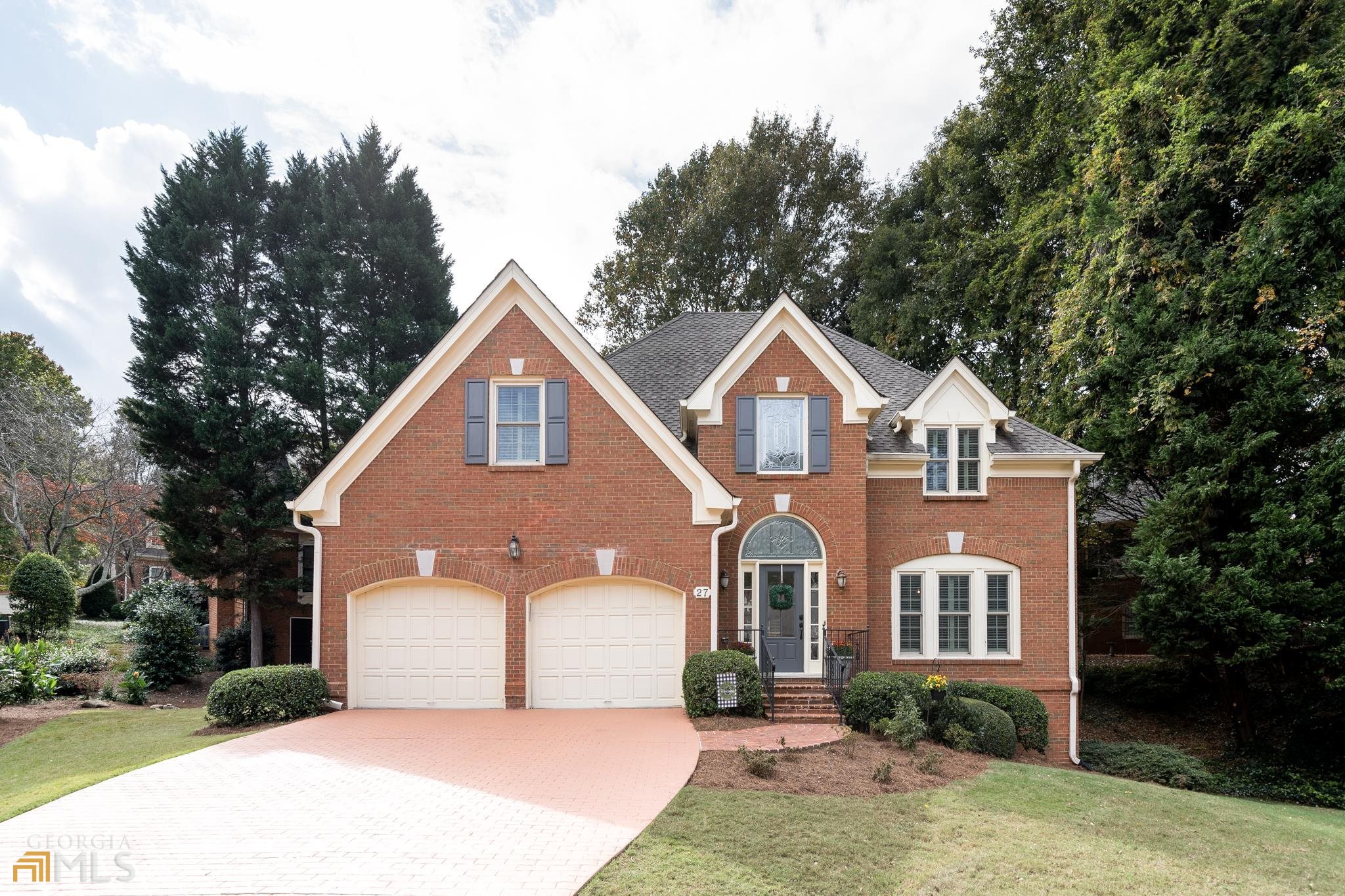 Don't miss out on this expansive traditional four side brick home in the sought after Lakeside High School district. Enjoy the spacious primary suite on the main floor and three additional large bedrooms upstairs. Abundant natural light permeates this relaxing and well maintained home. Kitchen includes stone countertops, a breakfast area and double ovens for the residential chef. Expansive living area features large fireplace and built ins. The living area opens to a large rear patio great for grilling or relaxing. A large unfinished basement offers much potential and terrific storage space or plenty of room for your Peloton or home gym or office! This homes formal dining room is ready for those family gatherings and the two car garage and large driveway offer plenty of room for parking. You will not find this amount of square footage at this price nearby!