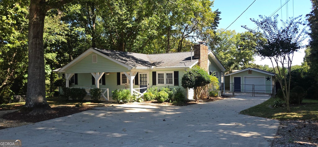 Photo of 6003 Lake Lanier Heights Road, Buford, GA 30518 (MLS # 10856095)