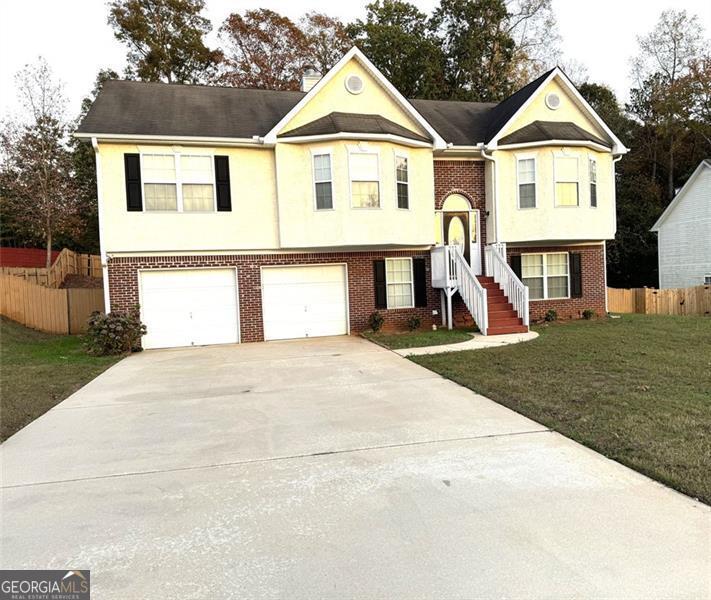 Welcome to this spacious 4-Bedrooms 3-Baths home in a quiet and convenient community. Master and two additional bedrooms on the main level. Fourth bedroom 1-bathroom and large family room on the lower level. Large private backyard