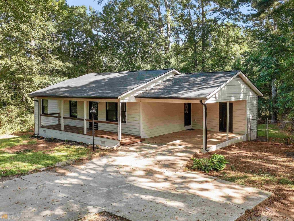 Photo of 1999 Hampton Locust Grove Road, Locust Grove, GA 30248 (MLS # 10730756)