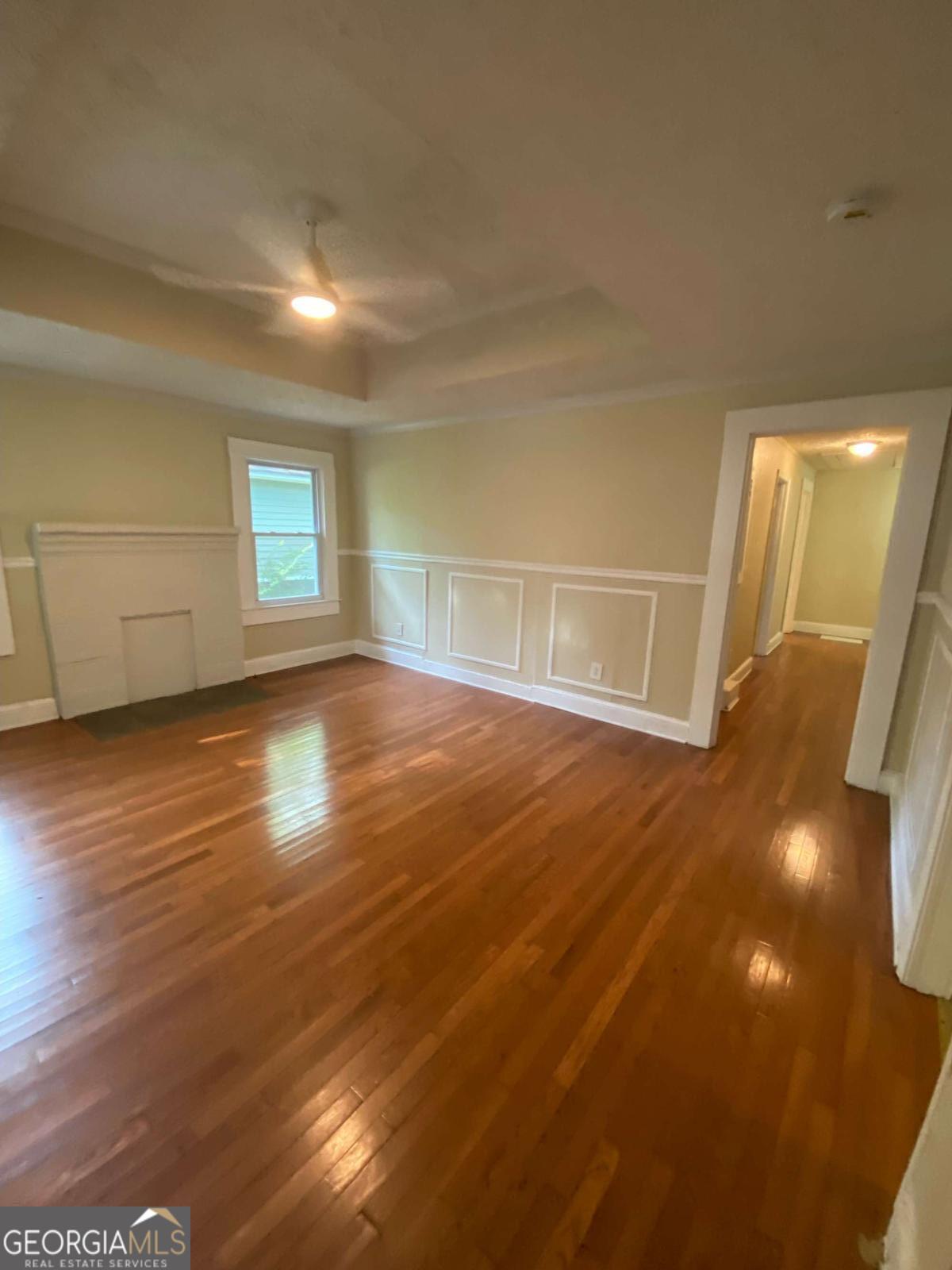 Sweet & Sassy Bungalow-Step onto the rocking chair front porch and into this bright and inviting home filled with historic charm and modern updates. Gleaming wood floors, abundant windows, and thoughtful touches make this home as charming as a Southern belle with a smart contemporary twist. Inside, you'll find 4 spacious bedrooms, an updated kitchen and bath, plus a full walk-in laundry room. The kitchen and bath blend modern style with timeless character, creating a warm, welcoming vibe throughout. Out back, enjoy a fenced yard and outdoor deck-perfect for a laid-back BBQ, entertaining friends, or simply relaxing under the stars. This bungalow has it all: character, comfort, and the perfect mix of old and new. Truly is a peaceful, cozy sanctuary located minutes from the airport, Downtown Pittsburg Yards, the Atlanta beltline South Trail, Grant Park, Summerhill, and the Lee and White development and food hall in West End.