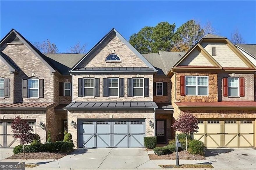 Stunning Townhome in Prime Alpharetta Location - Ready for You to Move In!  Welcome to this gorgeous townhome in one of Alpharetta's most desirable neighborhoods, just off Kimball Bridge Road! This home is a rare find, offering both style and comfort, and it's ready to be your next perfect rental. Available starting February 1st, 2025, this stunning property has been meticulously maintained, ensuring that you'll enjoy a space that feels brand new from the moment you step inside.  Upon entering, you'll be greeted by a spacious foyer that flows seamlessly into the bright and open main level. Gleaming hardwood floors cover the entire first floor, enhancing the home's warmth and elegance. The family room, complete with a cozy fireplace, invites you to unwind and relax. The open floor plan also connects the family room to the dining area, making it perfect for hosting dinners or simply enjoying a quiet meal. Natural light pours through the large windows, creating a bright and airy atmosphere throughout.  The kitchen is a true highlight of the home, featuring plenty of counter space, modern cabinetry, and a convenient layout for preparing meals with ease. Adjacent to the kitchen, you'll find a charming sunroom that's perfect for a morning coffee or reading your favorite book while soaking in the light. The main level also features access to a private patio, providing a serene outdoor space for grilling, relaxing, or entertaining.  Upstairs, the home continues to impress with three spacious bedrooms, including a generously sized owner's suite. The owner's suite features ample closet space and a luxurious en-suite bathroom with a separate tub and shower, offering the perfect retreat after a long day. Two additional well-sized bedrooms share a full bathroom conveniently located down the hallway. Plus, the second-floor laundry area makes chores a breeze, with everything you need just steps away from the bedrooms.  This home's prime location is the icing on the cake! Just minutes away from Avalon, North Mall Point, and a variety of shops and restaurants, you'll have everything you need right at your fingertips. Easy access to I-400 N and other major roads ensures that you can get anywhere in the city quickly, whether for work or leisure.  With its combination of great finishes, spacious layout, and an unbeatable location, this townhome offers the ultimate in Alpharetta living. Don't miss the chance to make this beautiful property your next home. Schedule a tour today and see for yourself why this townhome is the perfect place to call home!  Available February 1st, 2025.