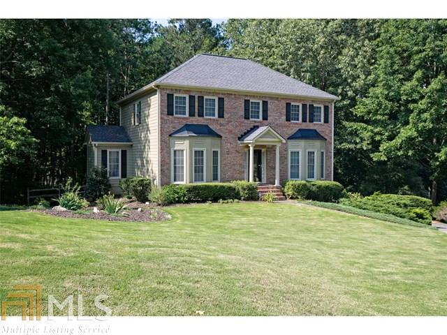 Exceptional 2-story home w/large bedrooms and lots of living space. Hardwood flooring throughout the formal dining and living rooms, as well as the spacious great room. The large kitchen features white cabinets, granite counters and a wonderful center island. The kitchen and bathrooms all feature upgraded tile flooring. The spacious master suite is a relaxing retreat with French doors opening into the spa styled master bath. The large cul-de-sac lot features a fenced-in area and an additional area that would be great for sports or a playground set.