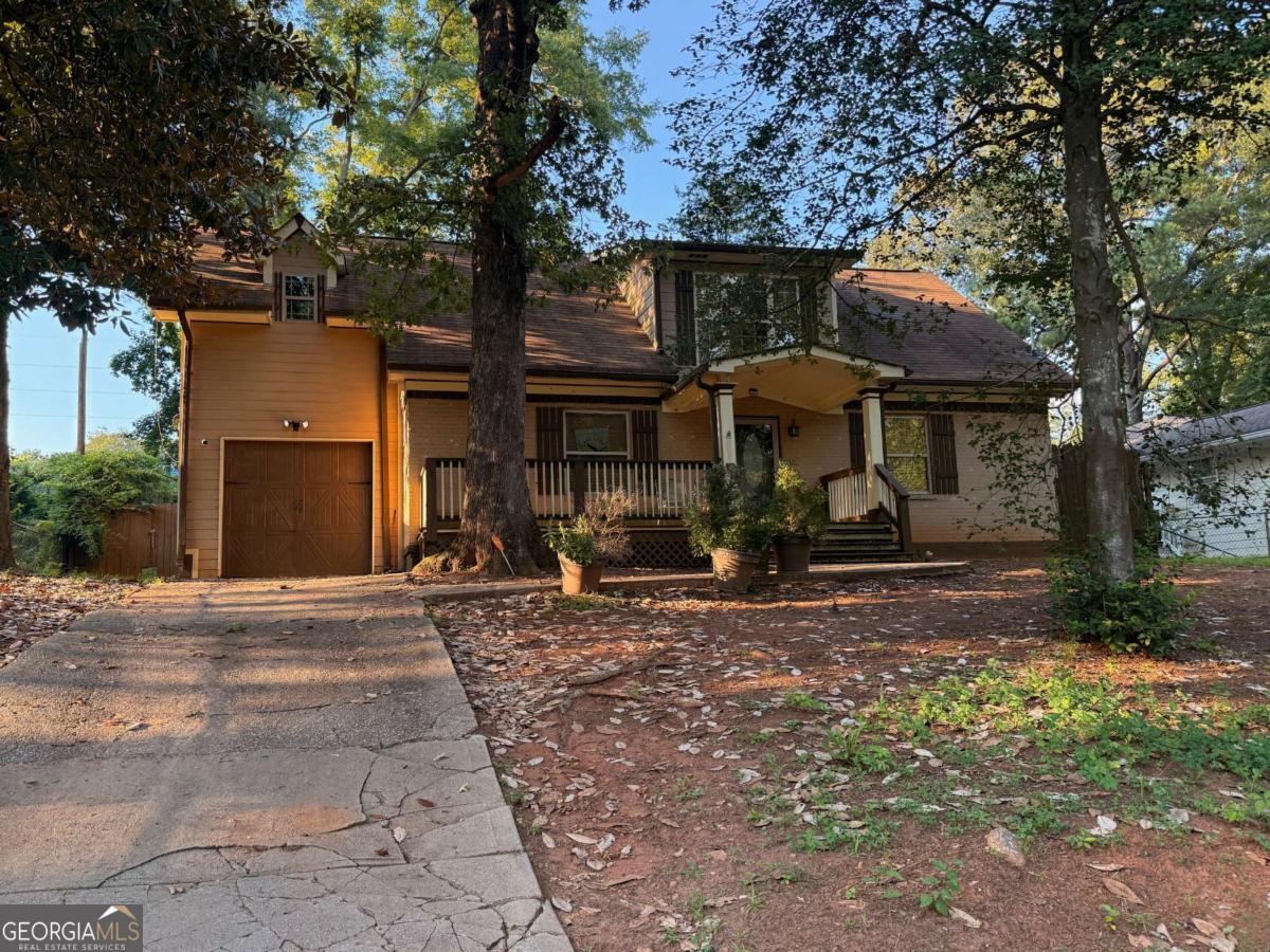 This diamond in the rough will need some TLC. 2 levels, modern finishes just waiting on your final touch!