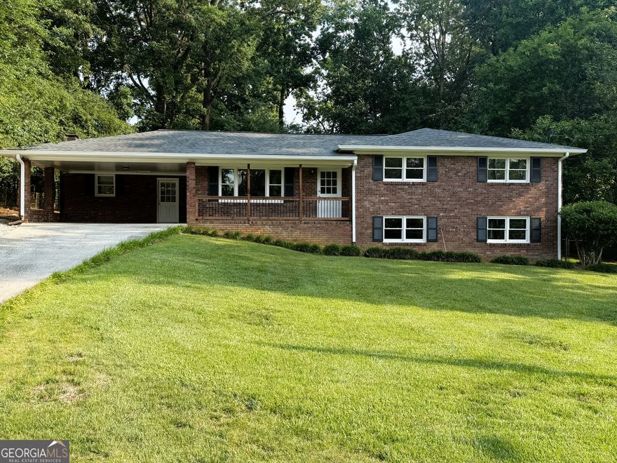 || ALL-BRICK RANCH WITH BASEMENT || || NEWLY UPDATED KITCHEN || || NEWLY RENOVATED BATHROOMS || || NEW WINDOWS || || NEW HARDWOOD FLOORS || || LARGE FENCED LOT || || NO HOA + NO RENT RESTRICTIONS || || NEARBY SWIM/TENNIS AT PIEDMONT BEND || ** What You'll See **  Step into an all-brick ranch gleaming with NEW HARDWOOD FLOORS and FRESHLY INSTALLED WINDOWS that fill each room with soft, natural light. The UPDATED KITCHEN boasts sleek countertops and modern cabinetry, while the RENOVATED BATHROOMS offer a fresh, clean aesthetic. Outside, you'll admire the LARGE, FENCED-IN LOT-perfect for pets, play, or peaceful gardening. The unfinished basement offers untapped potential with plenty of room to expand or store. ** What You'll Hear **  In this PEACEFUL, PRIVATE SETTING, the only sounds are the birds in the morning and the breeze moving through the trees. No HOA means no neighborhood noise or restrictions-just the low hum of easy living. Join nearby Piedmont Bend for summer laughter and the splash of swim and tennis courts without the obligation. ** What You'll Feel **  You'll feel free. With NO HOA and NO RENTAL RESTRICTIONS, you have the liberty to live, lease, or create an income stream. The TRANSFERABLE HOME WARRANTY brings peace of mind, and the cool touch of new hardwood beneath your feet adds confidence in every step. Enjoy the sense of ownership that comes with a SOLID BRICK HOME built to last. ** What You'll Experience **  This is your canvas. A quiet space with INCOME POTENTIAL, ready to reflect your vision-whether it's cozy living or cash flow. Picture evenings on the back lawn, kids playing safely within the fence, or a future finished basement crafted to your needs. The convenience of storage, serenity, and smart updates all come together in a home that truly feels like yours.