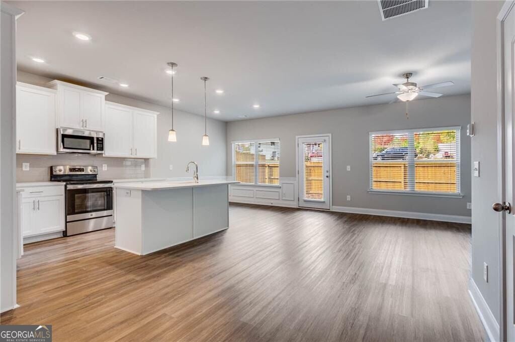 Photo of 500 Rockfern Court, Lilburn, GA 30047 (MLS # 10855415)