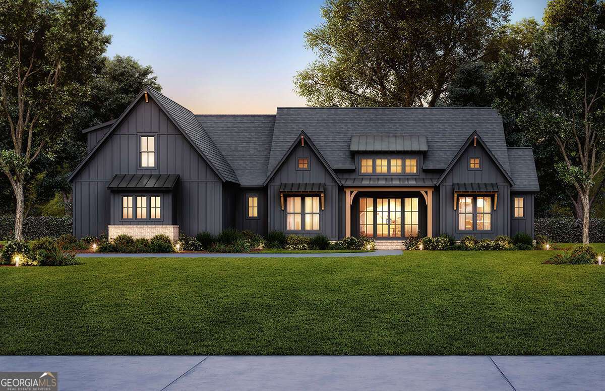 Grand contemporary luxury mountain-style TO BE BUILT new construction home with 4-5 bedrooms on a peaceful 3.56-acre wooded lot in Georgian Highlands! This home will be built by Precision Custom Home Builders, a true custom builder offering flexibility to adjust floor plans, expand living areas, and select finishes through the builder's design center. The design combines grand, contemporary mountain architecture with spacious, livable detail. A vaulted great room with fireplace and built-ins anchors an open floor plan that flows seamlessly into the dining area and kitchen with an oversized island, walk-in pantry, and abundant natural light. Ten-foot ceilings on the main level enhance the open, airy feel. The owner's suite includes dual vanities, a soaking tub, and a walk-in closet with direct laundry access. Three additional bedrooms and a shared bath complete the main level, making this a true 4-bedroom home. An optional 2nd-floor bonus room with a full bath can be added, creating a 5th bedroom with bath, hobby room, or office. A covered front porch, rear porch, and a side-entry 2-car garage provide both curb appeal and functionality, with an optional 3-car garage upgrade available. This home will be built on a slab foundation for easy access and low maintenance, with an optional basement available if desired. The 3.56-acre wooded homesite is a rare find in the mountains: beautiful, walkable land that gently rises to a broad ridge with gentle, buildable areas and an easy driveway approach. The back of the lot slopes gradually to reveal seasonal North Georgia mountain ridge views, offering a stunning backdrop once your home is complete. Surrounded by mature hardwoods, this peaceful setting provides privacy, quiet, and space for outdoor living or recreation-without the distraction of highway noise. Georgian Highlands is a gated luxury mountain community located in the North Georgia Blue Ridge Mountains along the Burnt Mountain Range. Roads meander through a deciduous forest with a state park feel. It is a well-maintained neighborhood that values mountain stewardship and respects the abundant wildlife that live here. No rentals are allowed in this community, preserving its quiet residential character. HOA fees are reasonable, and residents enjoy a balance of privacy, natural beauty, and convenience. The community is approximately 20-25 minutes to Jasper and Ellijay, and about 1 hour to the greater Atlanta perimeter. TO BE BUILT new construction home, built to today's energy efficiency standards. Renderings are representative only. Staged interior photos may show furnishings, finishes, or features not included in pricing. Terrain and satellite imagery are not a survey. All house plans and exterior selections must be approved by the HOA architectural committee. Per HOA policy, all buyers must be accompanied by an agent. Estimated build time is approximately 12 months from contract.