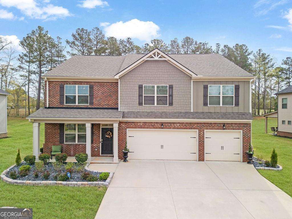 Welcome home to 8033 Louis Drive! A meticulously cared for residence nestled within the esteemed Heron Bay Golf & Country Club community. Located on the 1,100-acre Cole Reservoir, Heron Bay has one of the most picturesque and coveted locations on Atlanta's Southside. This expansive 5-bedroom, 4.5-bathroom home offers fined living space, thoughtfully enhanced with new contemporary elements. The gourmet kitchen is the heart of the home, featuring a spacious island, breakfast area, and walk-in pantry. The kitchen also includes stainless steel appliances, with the refrigerator conveying at closing! Elegant living spaces await, with a co-living/dining room providing sophisticated settings for entertaining, while the family room, centered around a cozy fireplace, offers a warm and inviting atmosphere. Rounding out the main level, the private guest suite ensures comfort and privacy for visitors. Upstairs, an oversized loft offers versatile space for leisure and entertainment, accompanied by three additional generously sized secondary bedrooms. The luxurious primary suite serves as a private retreat, featuring a spa-like bathroom with a soaking tub, separate shower, and dual vanities, complemented by a spacious walk-in closet. This home has been recently updated with new hardwood flooring, contemporary lighting fixtures, and fresh interior paint, aligning with the latest design trends that favor rich, saturated colors and layered textures. Outside, the property boasts a level lot with a dual irrigation system, providing a well-maintained outdoor space suitable for gardening or gathering. Residents of Heron Bay enjoy a wealth of amenities, including a clubhouse, golf course, lake, fitness center, playground, pool, sidewalks, and tennis courts, all contributing to a vibrant and active lifestyle. Conveniently located near I-75, this home offers easy access to major highways, shopping destinations like Southpointe shopping center, Tanger Outlets, and attractions such as the Atlanta Motor Speedway. Happy Showing!
