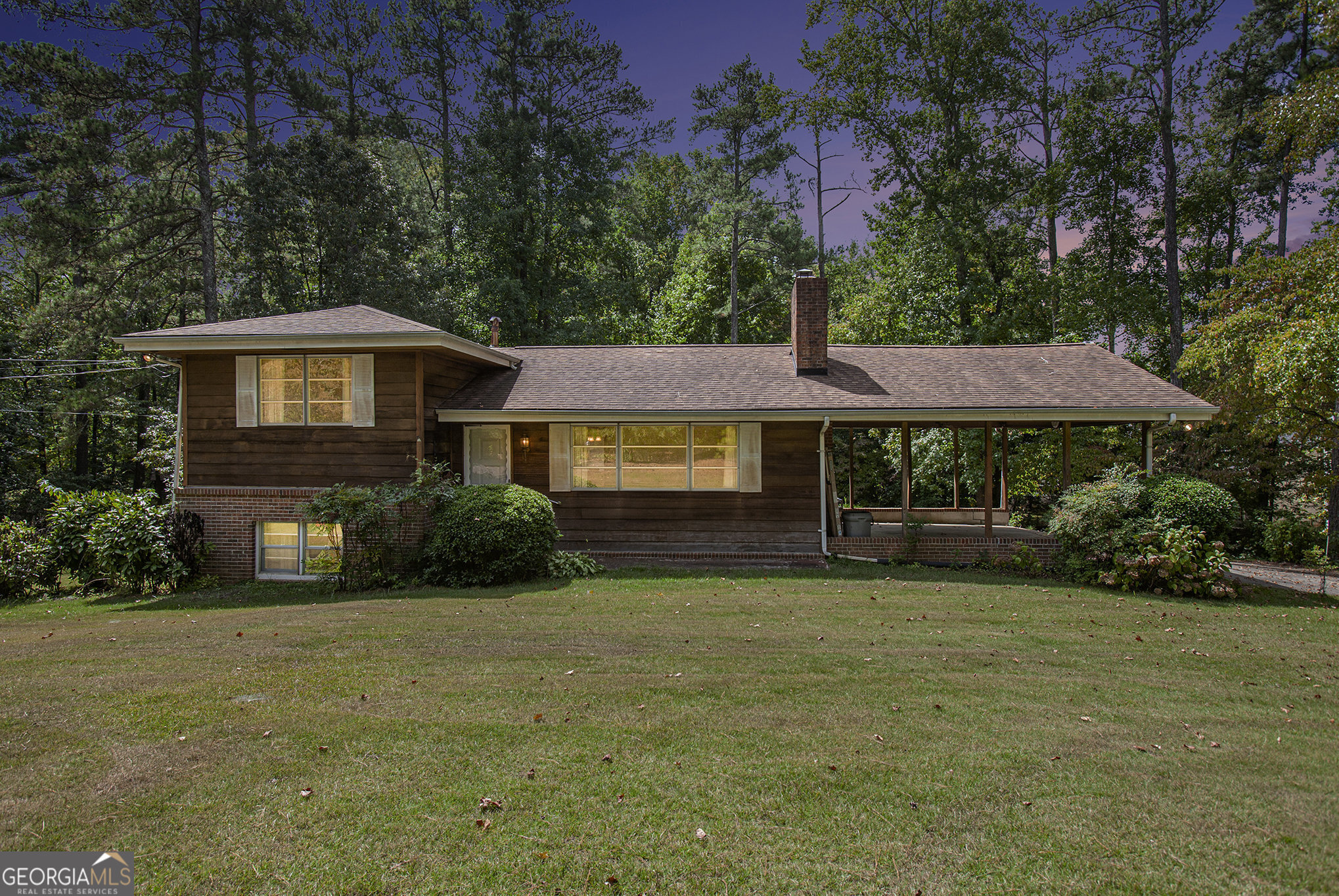 This home features a WORLD of possibility! Located in a very sought-after part of Marietta, this home is situated on 2.5 Acres which could be rezoned into gorgeous commercial or mixed-use property. This could also just be a home you call your own, with a little TLC and some updating this beauty with the land could easily be very equity-rich. Home has two kitchens and two living spaces with 4 bedrooms and two baths. The home is set up with a roommate floor plan in mind, there is so much that you could do with the abundance of space. The Land is flat and extremely useable. Come and see it today, let your imagination take over.