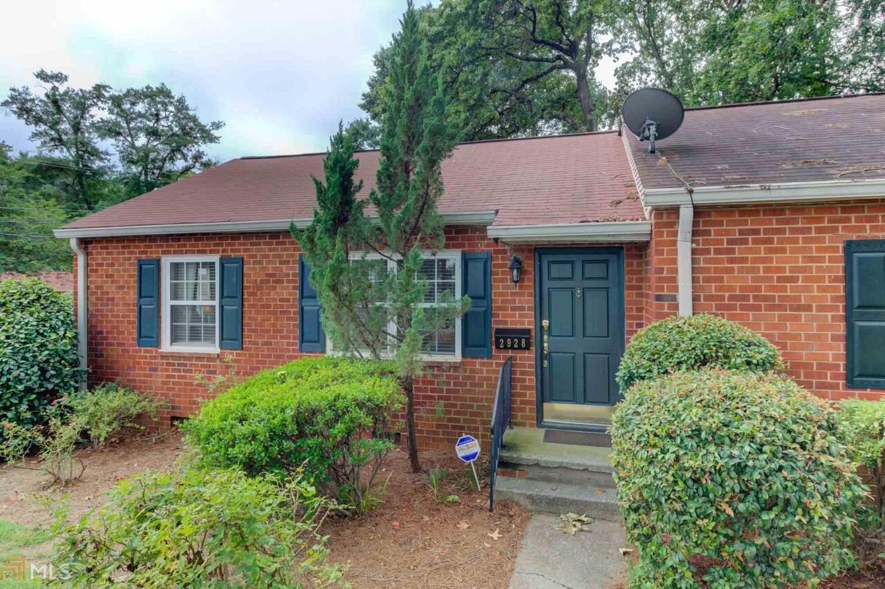 This adorable condo in the heart of Smyrna is minutes from Smyrna Market Village, Publix, Parks, Silver Comet Trail, and more. It's just the perfect blend of comfort and charm. An abundance of natural light with fills this end unit! Hardwoods throughout, crown molding, and lots of details. The layout flows incredibly well with the sizable Great Room to the open kitchen onto the Sunroom. The Sunroom with open shelves, white washed brick wall, and lots of windows makes the perfect home office, dining room, or second den. Kitchen features Stainless Steel appliances, tile backsplash, lots of stained cabinets, updated fixtures, and recessed lighting. Both bedrooms have crown molding. Newer Roof. Private back deck. Very serene and peaceful. This is a must-see!!