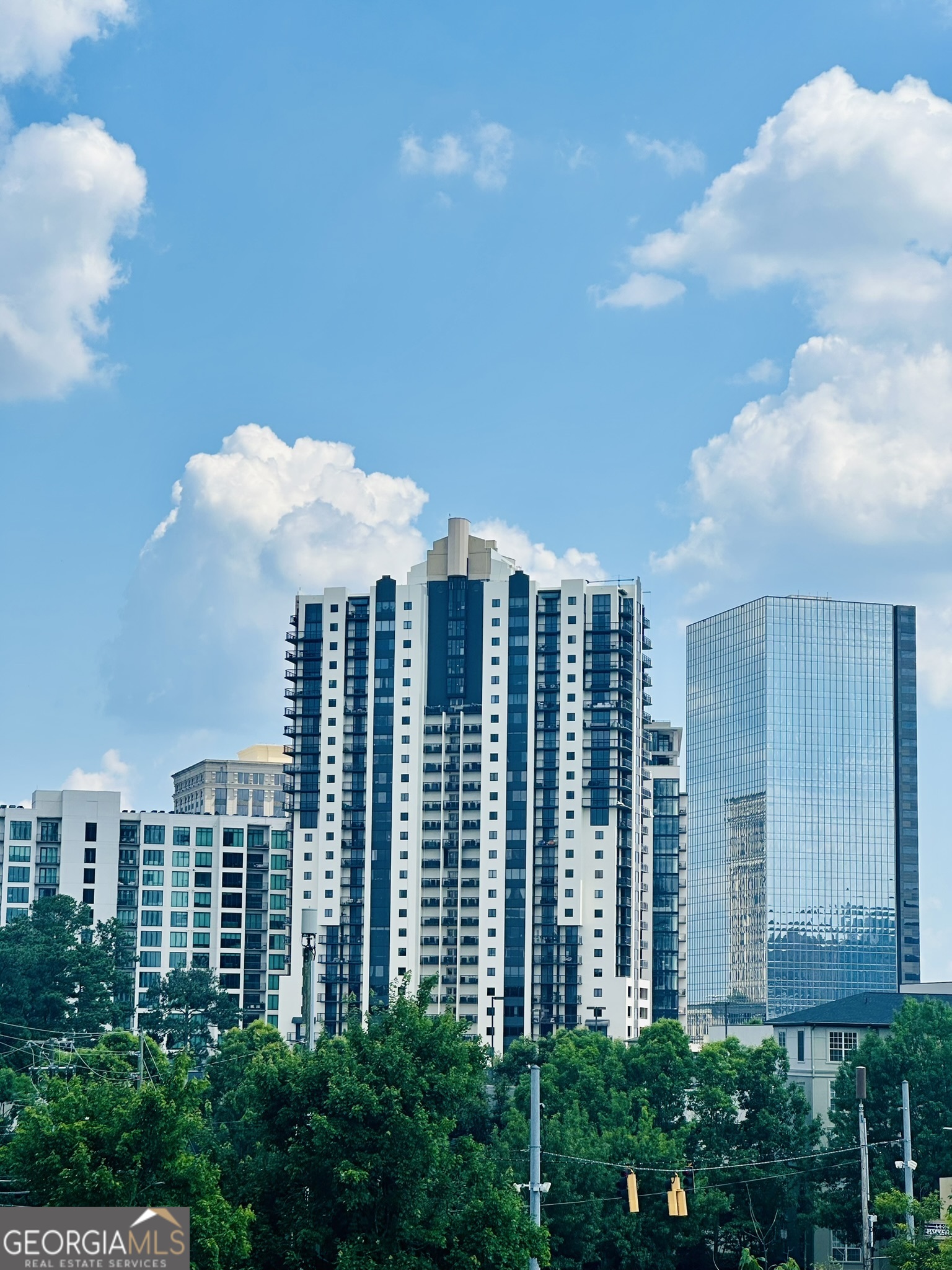 PRIME BUCKHEAD LOCATION HIGH RISE ON 23RD FLOOR. Completely renovated with two balconies,new hardwood floors,fresh paint,floor-to-ceiling windows in primary suite,updated kitchen with granite counters,white cabinets,hands-free on/off faucet,hot water dispenser,BRAND NEW HVAC system,& new dark out shades for both bedrooms. Primary suite with private renovated bath & walk in closet.Secondary bath updated with steam for shower & new glass doors for tub/shower.Secondary bedroom with walk in closet and built in storage.New washer/dryer to remain with property.Storage unit included & much more. Amenities include 24/7 Concierge,pool,two gyms,conference room,recently renovated lobby with private gathering room complete with piano, sofas & chairs, & library,covered drive-under at front of bldg. for deliveries/pickup or drop off residents & guests,electric car charging stations,guest parking,entire renovation of club room w/TV's,game tables,pool table,kitchen. Media room for watching sports,movies,etc. Brand new sauna, exterior jacuzzi overlooking pool.Patio deck for outside grilling and entertaining. Minutes to Phipps Plaza,Lenox Square, GA400,Marta,Nearby Dog Park,Publix,Fine Dining restaurants,& much more...Rare opportunity to live in one of Buckhead's most sought after high rises.