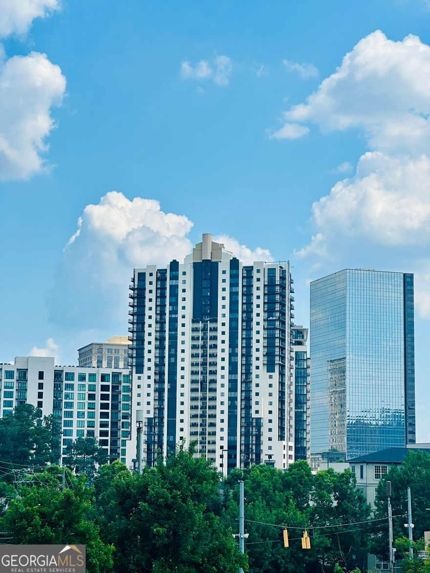 PRIME BUCKHEAD LOCATION HIGH RISE ON 23RD FLOOR. Completely renovated with two balconies,new hardwood floors,fresh paint,floor-to-ceiling windows in primary suite,updated kitchen with granite counters,white cabinets,hands-free on/off faucet,hot water dispenser,BRAND NEW HVAC system,& new dark out shades for both bedrooms. Primary suite with private renovated bath & walk in closet.Secondary bath updated with steam for shower & new glass doors for tub/shower.Secondary bedroom with walk in closet and built in storage.New washer/dryer to remain with property.Storage unit included & much more. Amenities include 24/7 Concierge,pool,two gyms,conference room,recently renovated lobby with private gathering room complete with piano, sofas & chairs, & library,covered drive-under at front of bldg. for deliveries/pickup or drop off residents & guests,electric car charging stations,guest parking,entire renovation of club room w/TV's,game tables,pool table,kitchen. Media room for watching sports,movies,etc. Brand new sauna, exterior jacuzzi overlooking pool.Patio deck for outside grilling and entertaining. Minutes to Phipps Plaza,Lenox Square, GA400,Marta,Nearby Dog Park,Publix,Fine Dining restaurants,& much more...Rare opportunity to live in one of Buckhead's most sought after high rises.