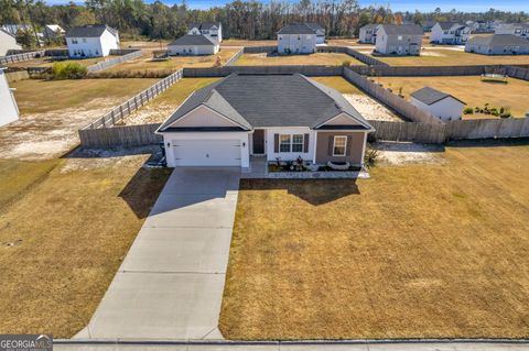 Photo of 158 NE Whippoorwill Way, Ludowici, GA 31316 (MLS # 10647911)