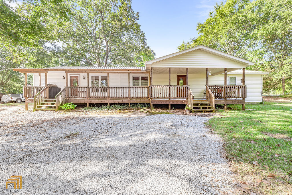 Jackson County home and acreage!! This beautiful, mostly pastured 20+ acres with home is a rare find. The home was originally built in 1950 and remodeling began in 1999. Updated electrical and plumbing was added during this time. The open living and dining area is perfect for entertaining. A large covered front porch is great for rocking chairs and swings to enjoy your morning coffee or the cool evenings. The home stands between large trees that provides privacy from the road. The property is fenced and waiting for horses, cattle or other farm animals. Located within minutes to East Jackson High School. The property also allows convenient access to Commerce, Athens, Jefferson and I-85. Property is under Agriculture Conservation until December 2023.
