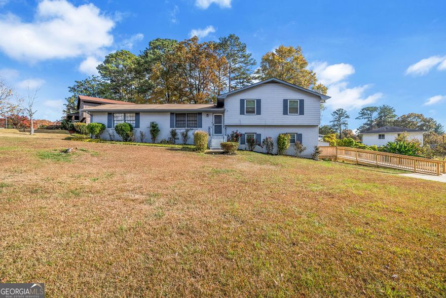 Charming and Versatile 5-Bedroom Home with Income Potential!    Welcome to your dream home! This beautifully updated five-bedroom, three-and-a-half bath residence combines comfort, functionality, and income potential. Nestled in a desirable neighborhood, this home is handicap accessible, featuring specially designed bathrooms and tubs to accommodate all needs. *Buyer to verify Sqft    As you step inside, you're greeted by a spacious, inviting living area that flows seamlessly into the modern kitchen. The upper level boasts three generous bedrooms, including a luxurious master suite with an en-suite bathroom, perfect for relaxation.    But the true gem of this property is the fully finished basement, which comes complete with a separate entry, a full bath, and a fully equipped kitchen. This versatile space can function as an in-law suite or an income-generating rental, giving you the flexibility to meet your lifestyle demands.    Additional features include:    - Fresh updates throughout, ensuring a move-in ready experience    - Spacious backyard for outdoor enjoyment and entertaining    - Ample parking space    - Conveniently located near local amenities, schools, and parks    Don't miss this incredible opportunity to own a stunning, accessible home with the added benefit of rental income! Schedule your showing today and experience all that this exceptional property has to offer!