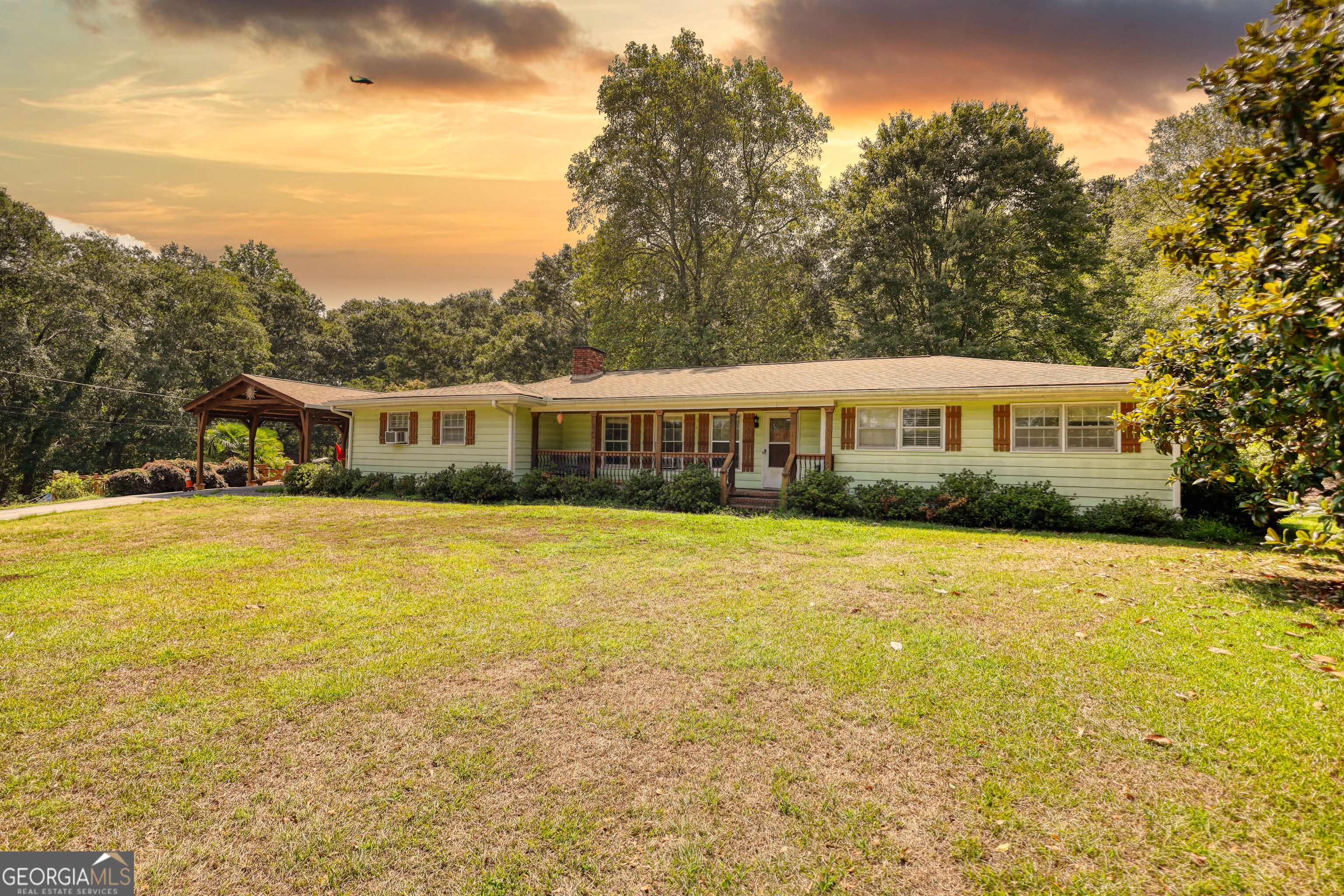 For Sale: Private Ranch Retreat in Sought-After Walton County Location: Walton County, GA 3 Bedrooms | 2.5 Bathrooms | 8+ Acres | Inground Pool | Fenced Pastures Welcome to your dream country retreat! Nestled in the heart of Walton County, this beautifully maintained ranch-style home offers the perfect blend of comfort, recreation, and rural charm on over 8 fully fenced acres. Main Residence Features: Spacious 3-bedroom, 2.5-bath layout with inviting open-concept living areas Modern kitchen with ample counter space and custom cabinetry Owner's suite with ensuite bath and walk-in closet Large windows offering scenic views of the surrounding pastures Outdoor Oasis: Inground pool with a custom tiki bar - perfect for entertaining or relaxing summer days Expansive patio and lounging area for outdoor gatherings Professionally landscaped with mature trees and open grassy areas Guest & Utility Structures: Detached guest/pool house ideal for visitors, rental potential, or in-law suite Multiple outbuildings for storage, workshop, or hobby farm use Fully fenced pastures - ready for horses, livestock, or your next agricultural project Property Highlights: 8+ usable acres, all completely fenced Level to gently rolling terrain ideal for horses or farming Secluded yet conveniently located with easy access to Monroe, Loganville, and Hwy 78