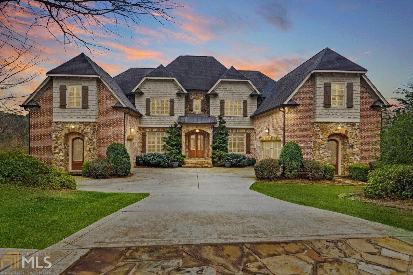 Come home to this family-centric neighborhood where you'll see kids playing outside in a close-knit community! Located within East Cobb's top Walton districts, this stately cul-de-sac home boasts high-end luxury features and amenities throughout! The completely private backyard is an escape where you can swim and relax on the Baja shelf in the heated saltwater pool year-round, equipped with an outdoor kitchen and beautiful stone patio. Beautiful kitchen with high end appliances. 6 burner Wolfe commercial grade double range, Sub Zero refrigerator, separate beverage drawers, walk-in pantry, huge laundry room. The gourmet interior kitchen offers top of the line appliances with open views to the oversized fireside keeping room! High ceilings throughout all levels provide an open and grand feel. Master Retreat on the main level features vaulted, beamed ceilings and 2nd stone fireplace for a true escape. All secondary bedrooms offer ample space and have ensuite baths as well! On the terrace level, you'll discover additional living space an even more opportunity for expansion.  There is a fabulous Au Pair suite with a separate entrance.  This home is sure to WOW all your senses.