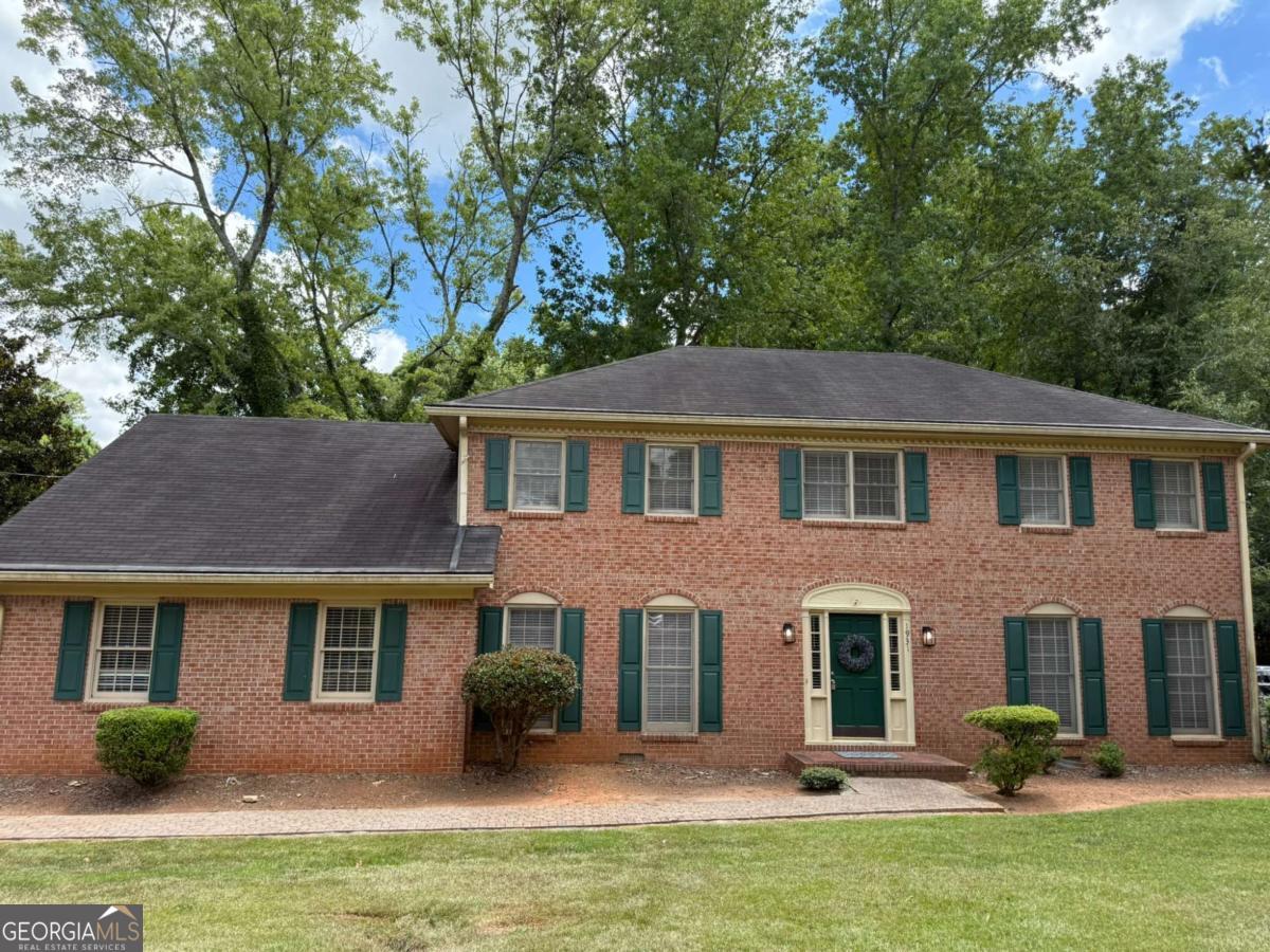 Looking to create your own dream home? This Fantastic Classic Dunwoody 5 Bedroom Floorplan has "Great Bones" to be what you want! Bring your Designer, Contractor, and Inspectors, and make this vision a reality! This home, originally a five-bedroom residence, boasts all the classic features of a traditional home, including an Entry Hall, Formal Living Room, Separate Family Room with a Wood Burning Fireplace, Separate Dining Room, Oversized Kitchen, and Separate Laundry Room. The Fully-Finished Basement with a Separate Office Space, Storage, and its own outside entrance will be the place where memories can be made. The top floor, where the Bedrooms are located, features walk-in closets. The Eat-in Kitchen is HUGE! Want to live in for a while, designing your dream? It is habitable and you can move in and live there today!!! And let's not fail to mention its 1/3 acre Corner Lot! The Garage is deep enough for SUVs and Trucks! This home has also been a great rental since 2012, generating over $400K income! This home is being Sold AS-IS with no disclosures. You are welcome to walk the property. See it today!!