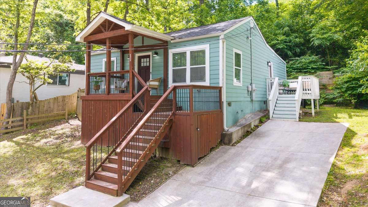 ***Motivated Seller*** Beautifully Renovated Bungalow in Atlanta - This 3-bedroom, 2-bath bungalow is located in one of Atlanta's most desirable and centrally located neighborhoods. Just minutes from Downtown, Midtown, and Buckhead, this home offers unbeatable access to Atlanta's top attractions - including the Georgia Aquarium, World of Coca-Cola, Georgia State University, Georgia Tech, Mercedes-Benz Stadium, and a vibrant mix of restaurants, parks, Quarry, and entertainment. Impeccably updated and maintained, this home is ready for its next chapter - whether as a stylish primary residence, a luxury rental, or a high-performing Airbnb investment. As an added bonus, furniture can be sold with the property, making this a seamless opportunity for buyers looking for a move-in ready or guest-ready home. Even better, this property is eligible for 100 percent financing! Inside, you'll find a bright, open-concept floor plan with hardwood floors and abundant natural light. The living area flows effortlessly into a modern kitchen featuring stainless steel appliances, granite countertops, and a designer glass tile backsplash. The primary suite offers a serene retreat with a spa-inspired bathroom and a sleek vanity faucet, while two additional bedrooms provide space for guests, family, or office use. From the inviting covered front porch to the private driveway and upscale design touches throughout, this home offers a blend of charm, functionality, and value that's hard to find. Whether you're a homeowner seeking comfort and convenience or an investor looking for a fully furnished, income-producing property in a high-demand area, this is an opportunity you won't want to miss. Schedule your private showing today and discover the potential of this Atlanta home.