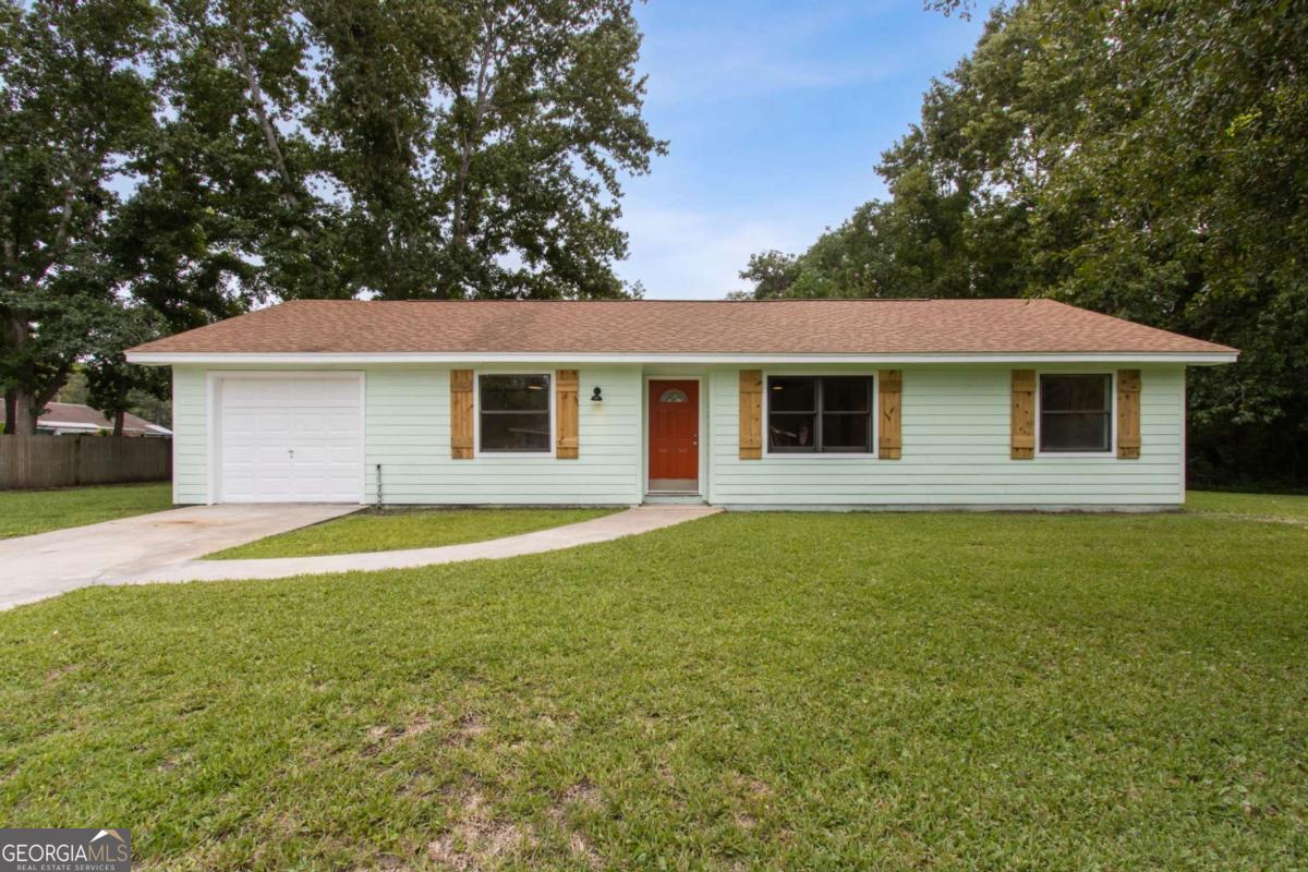 Charming Renovated 3BR/2BA Home on a Cul-de-Sac - 1,292 sq. ft. Don't miss this beautifully updated home offering comfort, style, and convenience! Featuring 3 bedrooms, 2 bathrooms, and 1,292 sq. ft., this residence has been completely renovated inside and out. Enjoy a fresh painted interior & exterior with new wood shutters, plus stylish updates including barn doors in the primary suite, tiled shower, new carpet in bedrooms, and upgraded bathrooms with new vanities, sinks & toilets. The kitchen boasts wood countertops and brand-new vinyl flooring with updated trim throughout the home. Additional upgrades include new ceiling fans, modern light fixtures, and new windows throughout for a bright, welcoming feel. Located just minutes from downtown St. Marys and local boat ramps, with easy access to Kings Bay Naval Base, Jacksonville International Airport, shopping, FLETC, Brunswick, Jekyll & St. Simons Island.