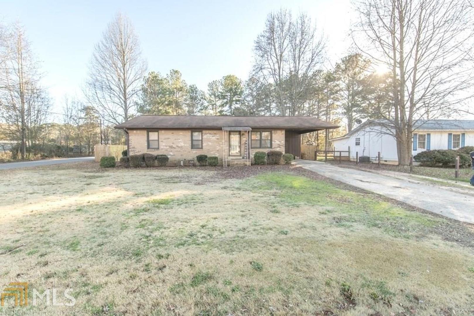 Located just outside of downtown Winder. Walk to town, grocery and parks. Pinterest perfect modern day farm house. Fenced in yard. Outbuilding large enough for boat. Custom built fire pit/smoker. 3 bedroom 1 full renovated bath. Sun room. New sub-floor and flooring within the last 6 months. New carpet in all bedrooms. New privacy fence around yard. New HVAC unit with 10 year warranty. All appliances will stay (fridge and stove). Playground will stay in back yard. This home has it all and then some. Don't wait because will not last long!