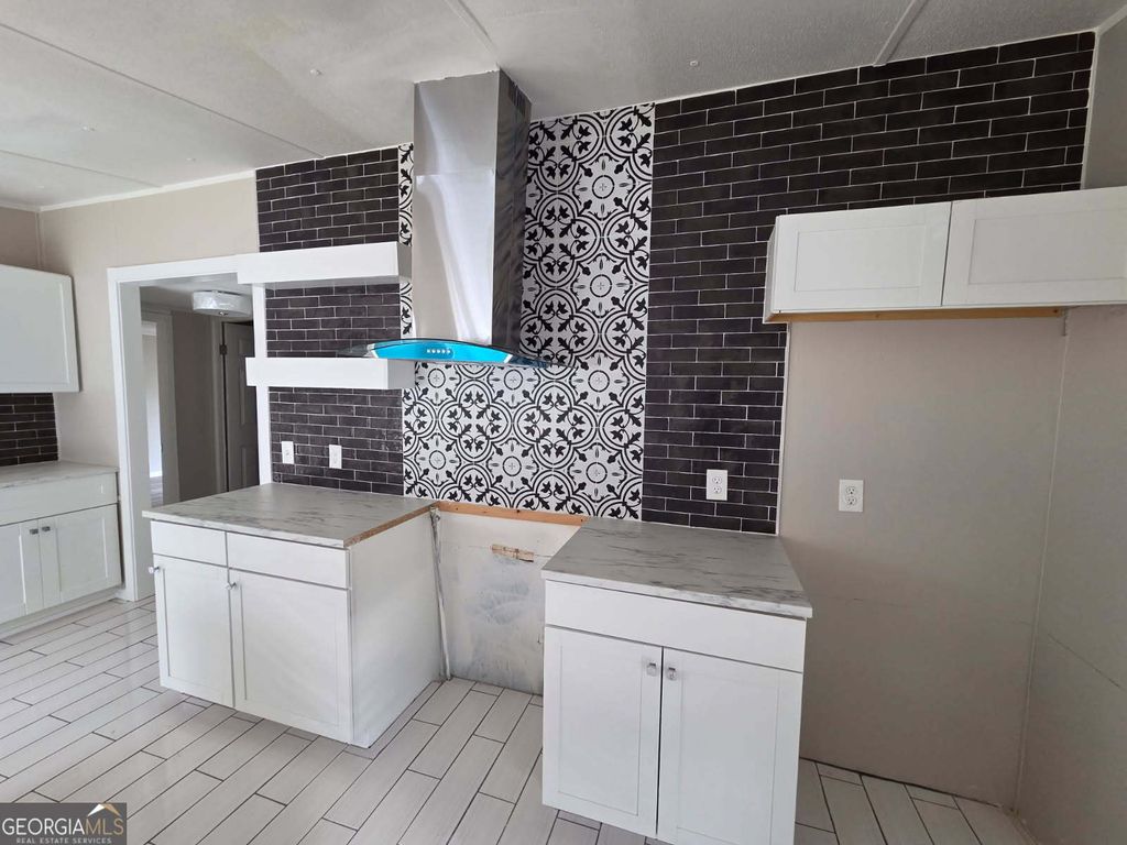 Photo of 21 CLUB Cir, Ellenwood, GA 30294 (MLS # 10655250)