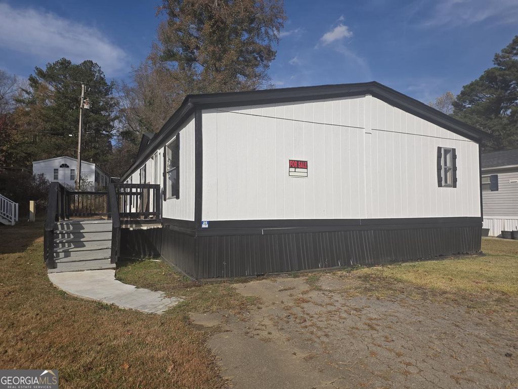Photo of 21 CLUB Cir, Ellenwood, GA 30294 (MLS # 10655250)