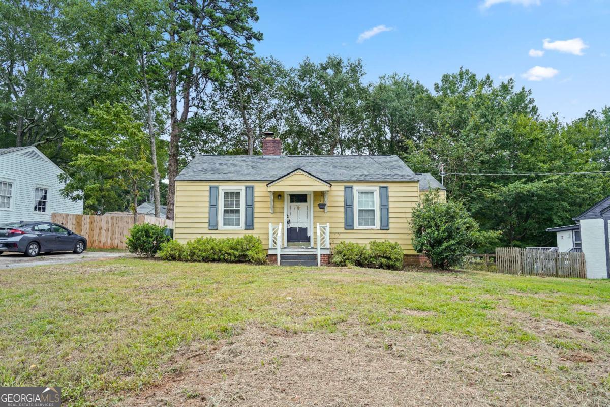 Charming home situated in a beautiful neighborhood walking distance from the Marietta Square! This is a cozy 2BR/1BA with original hardwood floors. There have been some updates on lighting, crown molding, new cabinets and fixtures. Open & updated kitchen/dining area, with some small renovations needed, making the finishing touches your own. The bathroom has been updated somewhat, with new ceiling fans and lighting. Breath taking back yard. Walking distance to Marietta Sq and park. This is an amazing home. Close to I-75 Express Access, Close to I-285, 45 minutes from Hartsfield Airport. 20 minutes from The Roxy, Atlanta Battery and Truist Park. Close to Little Kennesaw Mountain and the Chattahoochee River for all your outdoor recreation needs. Lots of Restaurants and Shopping Options on the Square, along Cobb Parkway, at Cumberland Mall and Town Center Mall. On a CCT / Bus route. 3-minutes from KSU's Marietta Campus and 15 mins from KSU's Kennesaw location.