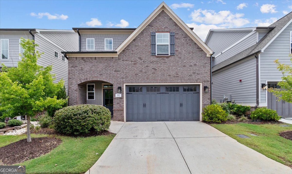 Beautiful brick front home in sought-after Promenade at the Square! This 4BR/3.5BA beauty offers nearly 2,700 sq ft of open living space with a spacious family room, gourmet kitchen featuring granite countertops, stainless steel appliances, gas cooktop, island & walk-in pantry. Main-level owner's suite includes a dual vanity, large shower & walk-in closet. Upstairs: spacious loft, 3 bedrooms & 2 full baths. Enjoy lawn care, sidewalks & pool-just minutes to Marietta Square, parks, golf, shopping & I-75.