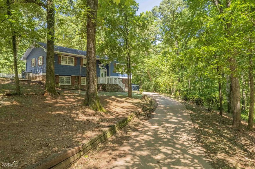 SELLER OFFERING 7500 TOWARDS CLOSING!!! As you turn on to the private winding driveway, making your way through the beautiful hardwoods, you will see this Newly polished Gem sitting atop its country hillside. Driving by the front door, you can't help but appreciate the beautiful, blue wood siding and stone faced foundation that is a craftsman's hand laid perfection. Pulling up to the spacious back deck and rear entry, you see the fenced in pool area awaiting your lounge chairs and grill! plenty of concrete around the whole pool for friends and family and a massive deck for outside entertainment. If it gets a Little loud, you have 11+ acres of land with equal distances in all directions to have a nice buffer between neighbors. plenty of outdoor parking, a garage, and even a RV parking pad with power onsite.      Once you make your way inside, you'll notice all the beautiful new updates, fresh paint, spacious kitchen with hand laid backsplash, granite countertops, perfectly placed island with stainless appliances. The walk in pantry can store more than enough food to limit those trips to the grocery store. This split level home boast plenty of light during the day at the right times, but also the trees provide shade to keep the utilities down. the master room is spacious, with views overlooking the pool, featuring a soaking tub in the master bath with a separate stand-up shower. The double vanity offers plenty of room with a wall to wall, touch activated mirror for extra lighting.       The basement features two spacious bedrooms that are very big in size for a big family or one of them can be turned into a media room for indoor entertainment. This property is ready for a beautiful family to call the Hart county area home. 10 minutes to the lake, making it affordable to be within a short drive to the one of the most beautiful lakes on the east coast, 50 minutes to Athens GA, Home of the Bulldogs! 30 minutes to South Carolina, all the while offering seclusion, peace and quiet. It is Zoned A3 so you do not have to worry about rows of subdivision popping up around you any time soon as well! This tastefully done home is turn key and will not last long, don't hesitate on this one.