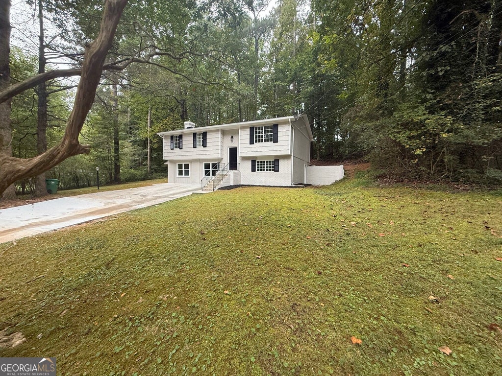 Photo of 5959 Simone Drive, Stone Mountain, GA 30087 (MLS # 10866636)