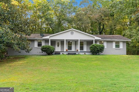 Photo of 228 Woodland Circle NW, Calhoun, GA 30701 (MLS # 10613532)