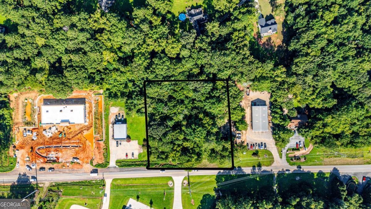 Prime 1.5-acre commercial parcel located on highly traveled Old Phoenix Road, just minutes from Highway 44. This property offers excellent visibility and accessibility, making it ideal for a wide range of business opportunities. With its strategic location near Lake Oconee's growing commercial corridor, this site provides strong traffic exposure and convenient access to surrounding residential neighborhoods, retail, and dining. A rare opportunity to secure a well-positioned tract in one of the area's most desirable growth markets.