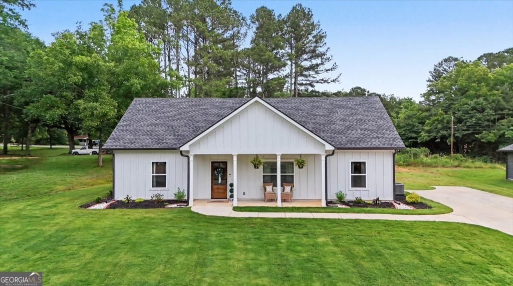 Photo of 91 Holly Road, Bowdon, GA 30108 (MLS # 10774892)
