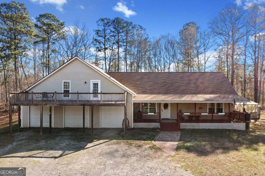 Tucked away on over 15 acres of picturesque countryside, this private retreat is more than just a home - it's a lifestyle. Surrounded by forestry land and private estates, this property offers unparalleled peace, space, and possibilities. This estate is ready for you. Whether you dream of multi-generational living, a homestead with space to roam, or a quiet escape from daily life, it welcomes all.    As you arrive, the front porch invites you to slow down and take in nature's beauty. Inside, you'll find a bright, open-concept living room and eat-in kitchen - perfect for gathering. The main floor features a spacious secondary bedroom and hall bath, while the primary suite is a true haven. The en suite bath boasts a tiled shower, a jacuzzi tub, and a walk-in closet. It's all about your comfort. Past the kitchen and down the hall, a mudroom leads to a 3-car garage, and beyond that, a living space and oversized bedroom with a freshly updated en suite bath and walk-in closet.    Upstairs, you'll uncover a fantastic second living area. This private suite works well for teens or in-laws. It features a vaulted great room, a full kitchen, and a bedroom. The bedroom has a walk-in closet that spans the whole length of the home. A full bath is part of the second level suite. Step onto the second-floor balcony and take in the view, or retreat to the private back deck for a quiet moment.    Outside, the level, cleared acreage with two creeks is ready for your vision - whether it's a hobby farm, a thriving garden, or an off-grid lifestyle. With ample space, privacy, and endless potential, this extraordinary property is waiting for its next chapter. Will it be yours?