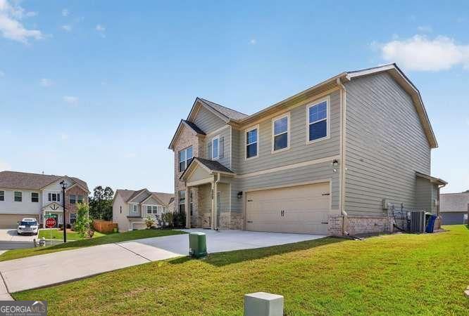 Photo of 4005 Diane Lane, Fayetteville, GA 30214 (MLS # 10803377)