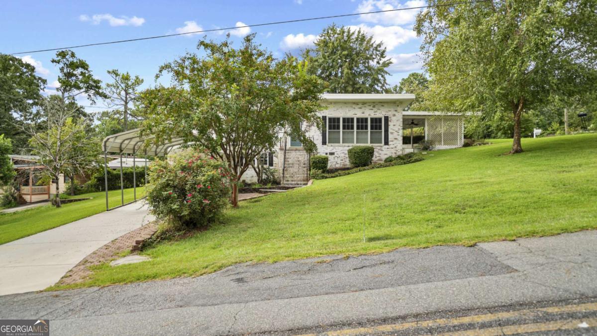 Charming Split-Level on a Corner Lot! This updated home features an inviting layout with an updated kitchen, the spacious lower-level has a bonus room, a full bath, and a fantastic laundry room. Enjoy evenings on the patio-perfect for relaxing or hosting cookouts with friends and family. This is ready for you to make it a home!