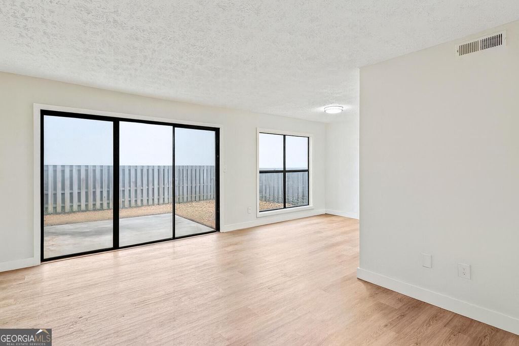 Photo of 102 Governors Drive, Forest Park, GA 30297 (MLS # 10654329)