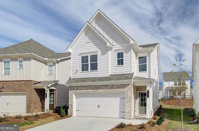 A community where luxury living meets the charm of Powder Springs, Georgia. Our exquisite 3 and 4-bedroom homes redefine comfort and convenience with attached 2-car garages, stainless steel appliances, and designer finishes. Here, you'll discover modern elegance in every detail. Oversized master bedroom with huge walk-in closets and features a five-foot shower, with a large double vanity in the master bathroom! The other rooms offer large living space and walk in closets. Plenty of natural light! Photos are representative of model home, and not actual home. Listing address is actual address of home. Schedule a tour of your new home today!