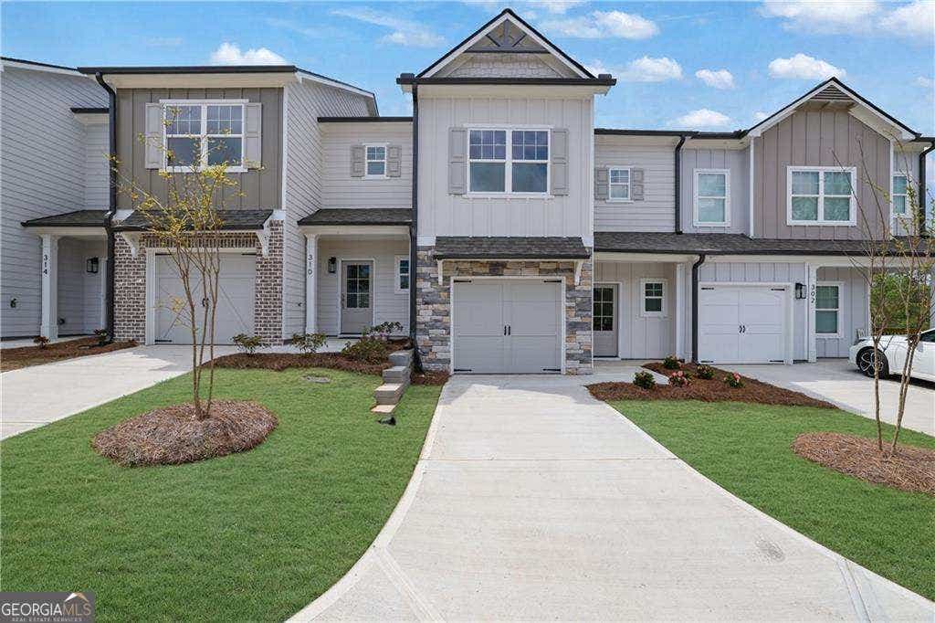 Photo of 306 Heron Street, Unit #16 ST, Ball Ground, GA 30107 (MLS # 10825800)