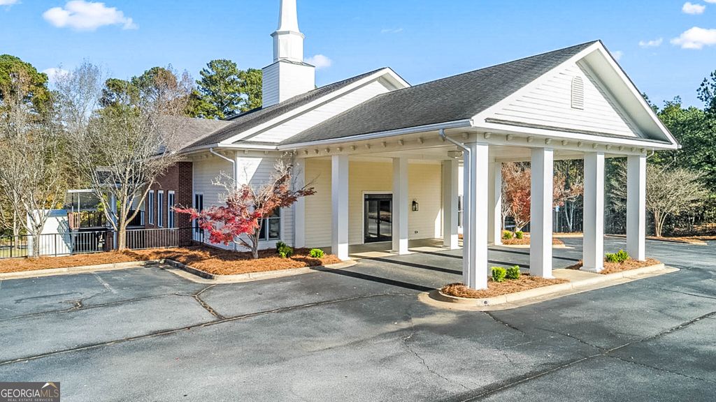 Photo of 3800 Lenora Church Rd, Snellville, GA 30039 (MLS # 10717128)