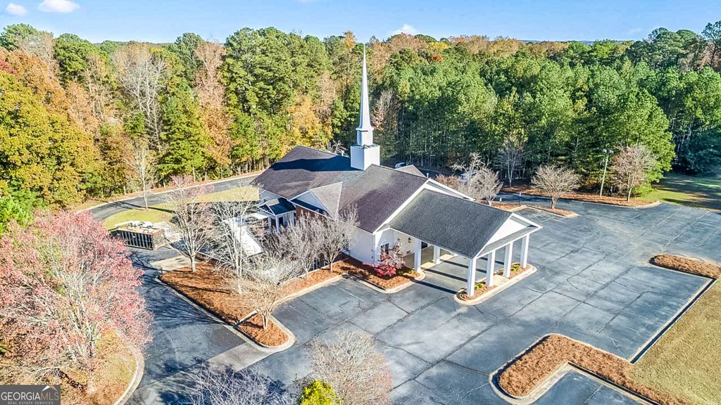 Photo of 3800 Lenora Church Rd, Snellville, GA 30039 (MLS # 10717128)