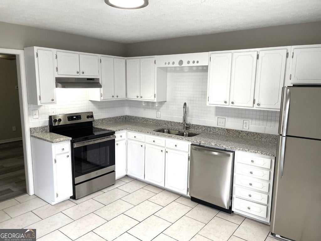 Photo of 859 Park Place #A, Conyers, GA 30012 (MLS # 10872714)